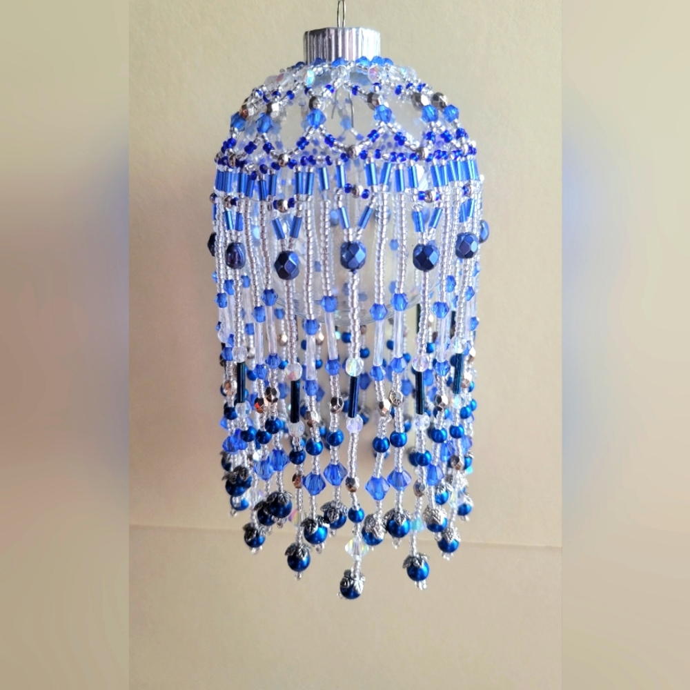 Handcrafted Christmas ornament cover.